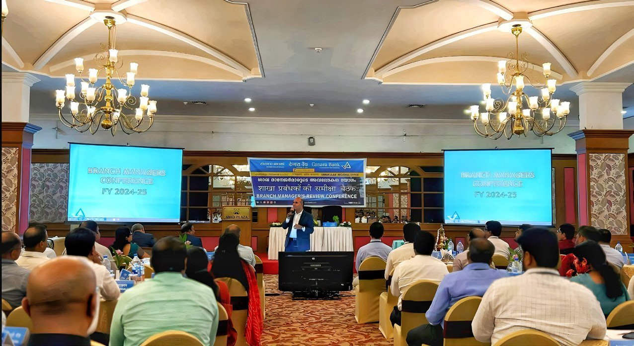 Corporate seminar led by Dr. Ajay Sanker in a large hall